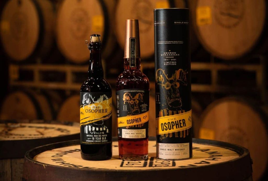Flying Dog Brewery and Colorado Whiskey Launch NFTs A beer and a whiskey on a barrel.
