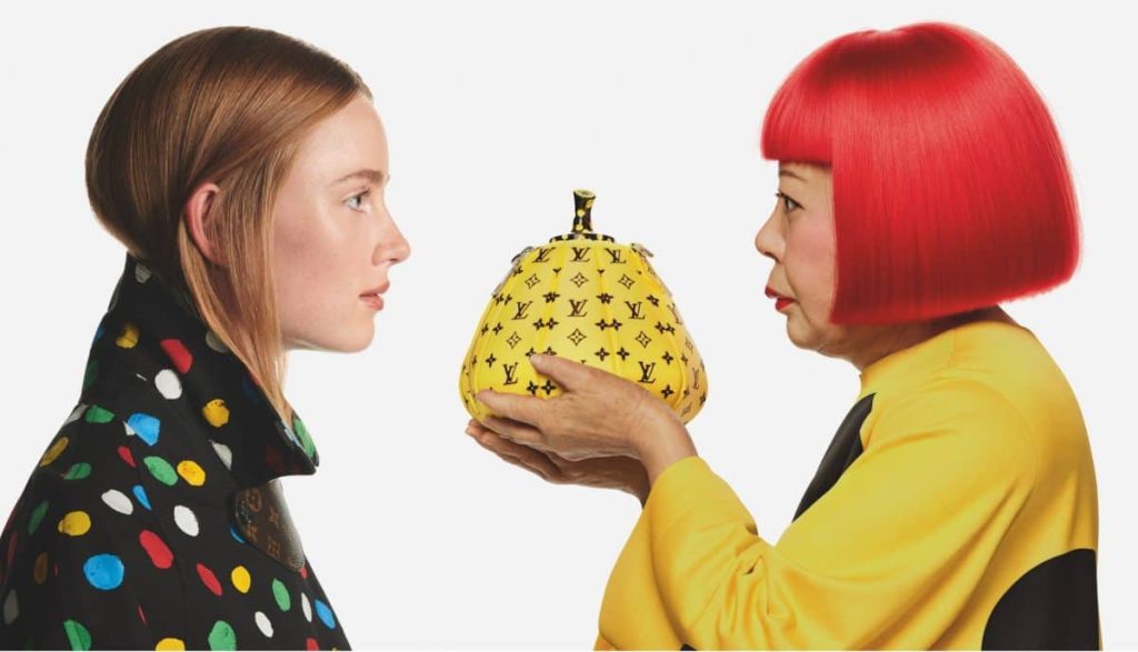 Louis Vuitton x Yayoi Kusama To Drop 10,000 NFTs Yayoi Kusama holds a yellow pumpkin with Louis Vuitton emblems in front of a model in support of the Louis Vuitton Yayoi Kusama NFT collection.