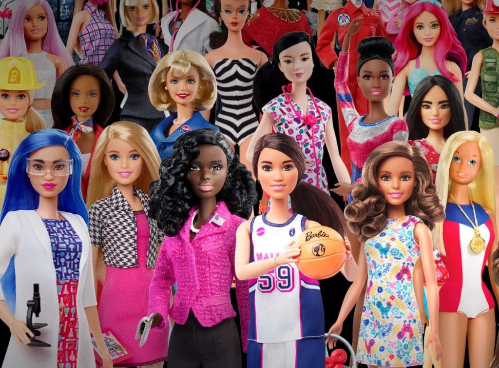 Barbie Partners With Boss Beauties For A New NFT Collection image of tens of Barbie dolls with various professions symbolizing their NFT collection